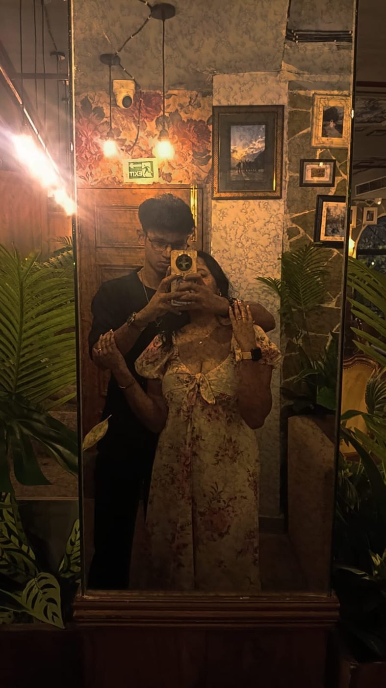 Us at a candlelit restaurant